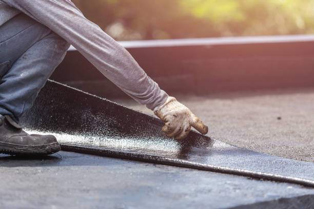 Professional Emergency Waterproofing technician working in Morganville, NJ